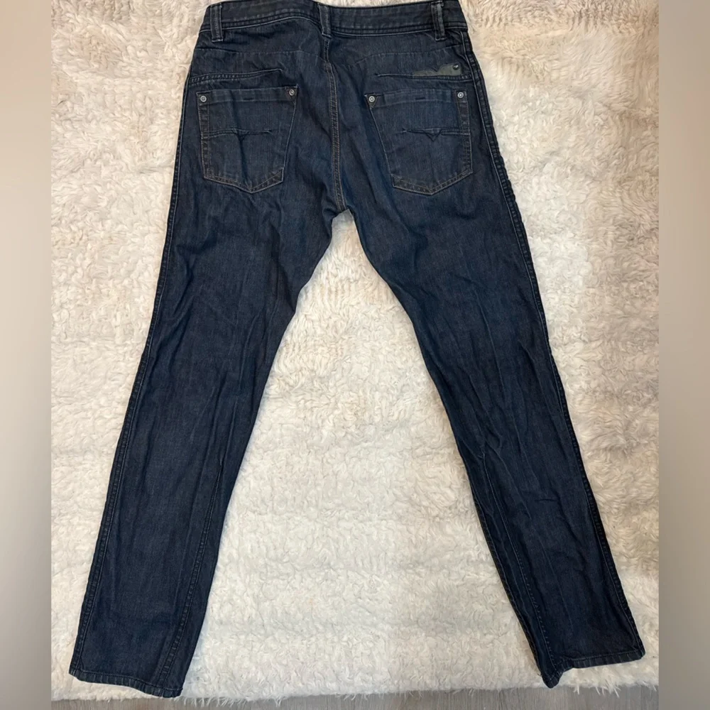 Diesel Jeans in Dark Blue Denim with Silver Button
